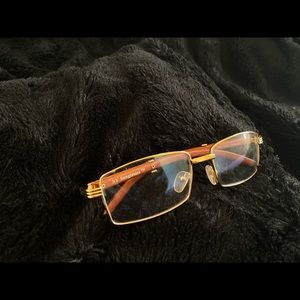 Gold brim/wood glasses.